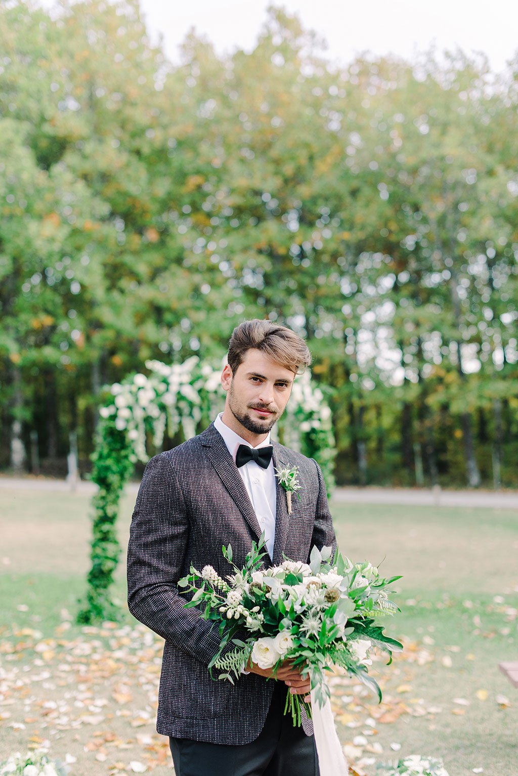 portrait the groom with the wedding bouquet, Inspirational boudoir & bridal photoshoot